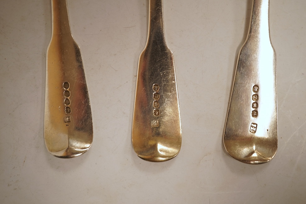 A matched set of six George III silver fiddle pattern table spoons, including four by Eley, Fearn and Chawner, London, 1820 and two London, 1808, 14.2oz.